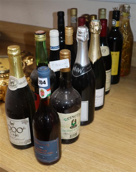 Four assorted red wines, two Champagnes and eight other assorted bottles